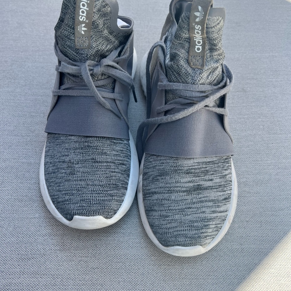 Gray Adidas tubular sneakers